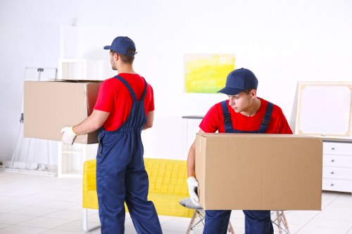 Man with van pricing information for a local Streatham move