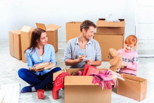 Removal van and movers handling a residential move in Streatham