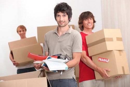 Local removals team handling student belongings in a Streatham property