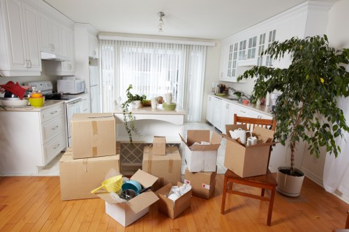 Local Streatham flat move with furniture being carried down stairs
