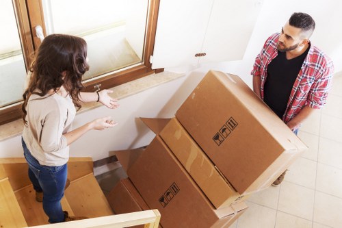 Packed boxes and furniture prepared for removal services in Streatham