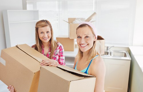 Local office removals team handling commercial equipment in Streatham